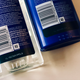 Tactile markings on shampoo and conditioner bottles.